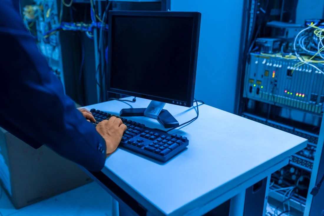 IT technician working in a server room